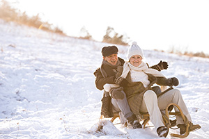 seniors sledding in winter